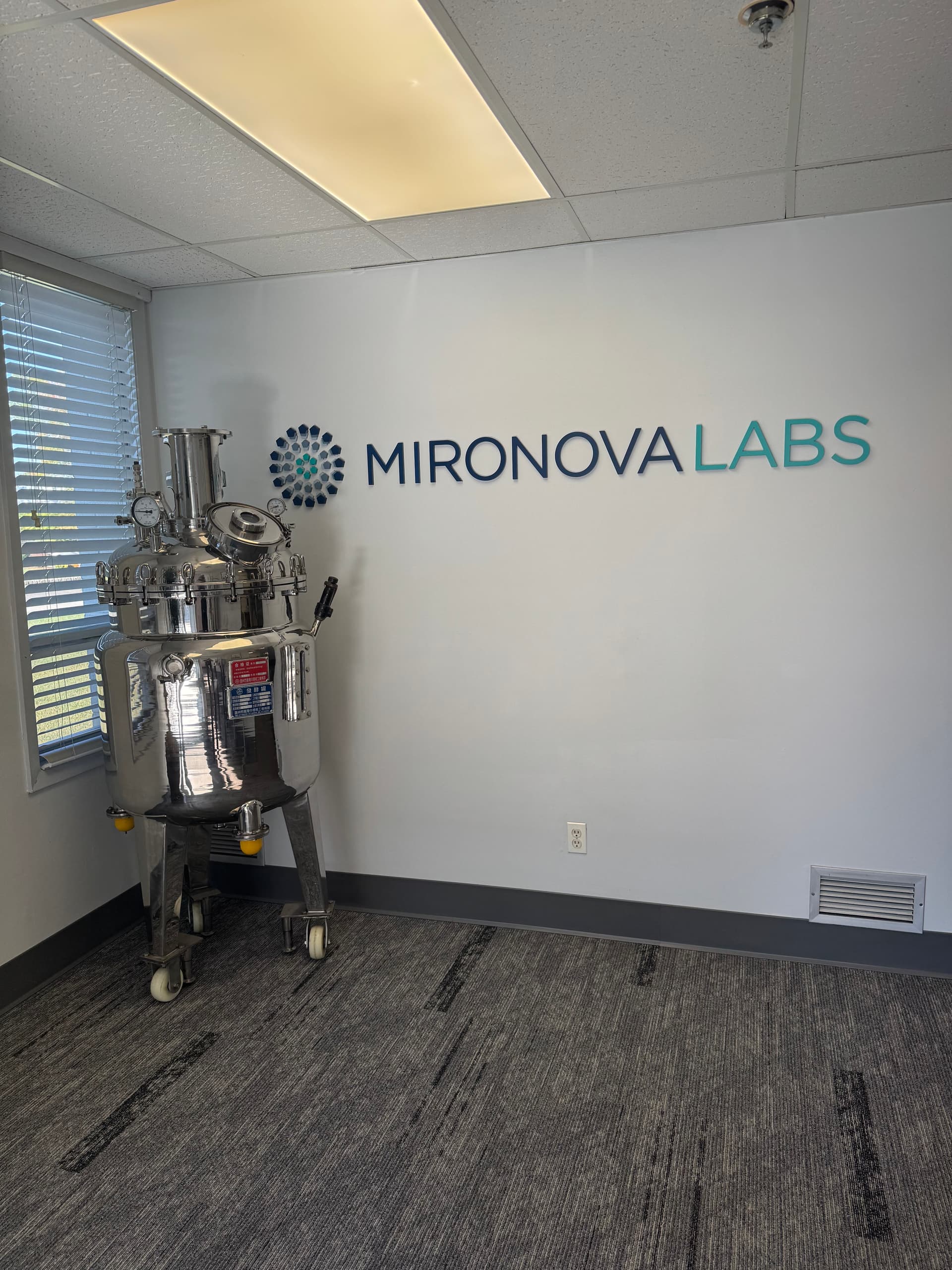 Mironova Labs signage and equipment in the Fairfield facility lobby